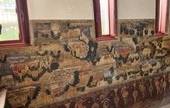 Mural details at Wat Uposatharam highlight the province’s riverside heritage.